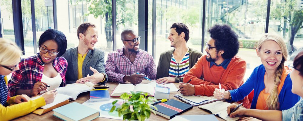 Multi-Ethnic Group of People Working Together Multi-Ethnic Group of People Working Together